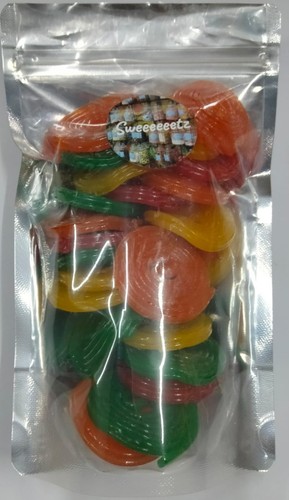 Coloured fruit wheels sweets - fruit,