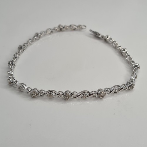 9ct white gold and - 9ct, diamond