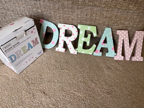 Next dream coloured wooden - next, "dream"