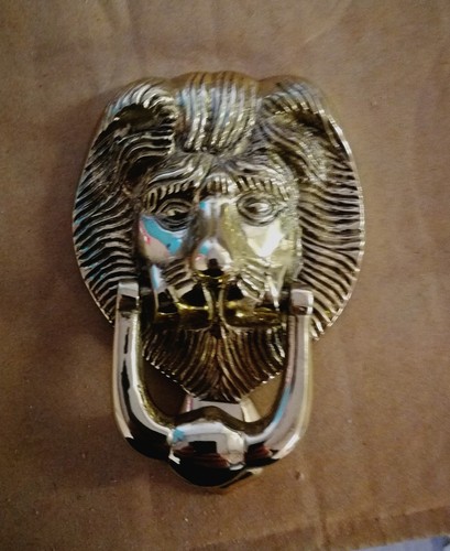 Brass lions head door knocker - lions,