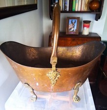 Antique brass boat shaped coal
