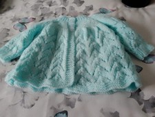 hand knitted matinee coat in
