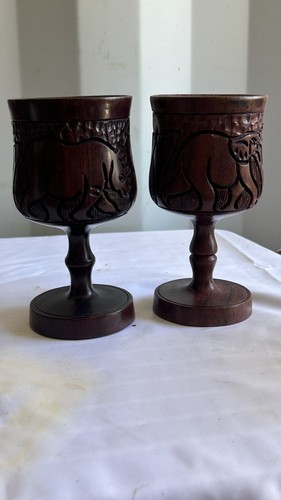Pair vintage hand carved - of,