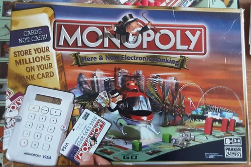 Monopoly here now - monopoly, electronic