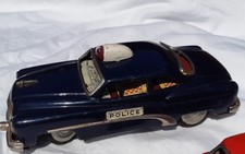 Vintage Japan Tin Toy Police Car,  from mid 1950-ths. Defect. Battery Powered
