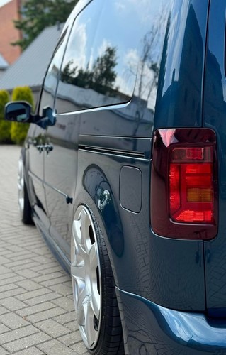 Caddy side loading door - side,