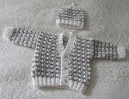 Hand knitted cardigan and hat