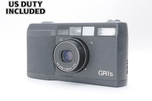 Exc ricoh gr1s - [exc+5], point