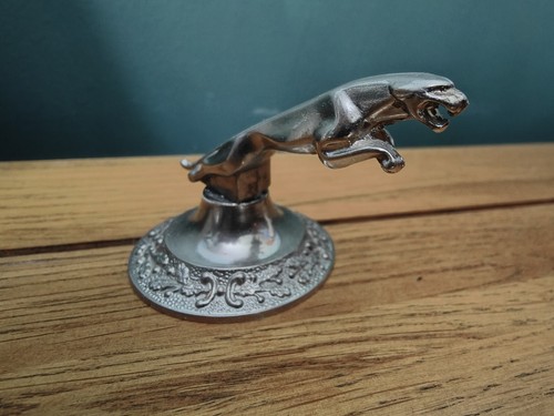 Metal chrome jaguar leaping - jaguar,