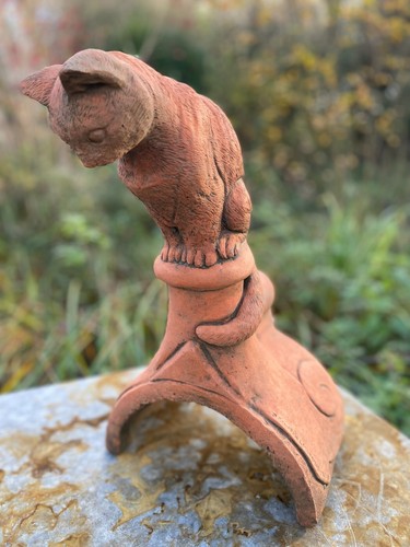 Curious cat roof finial - cat,