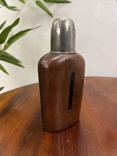 Vintage leather covered glass - covered,