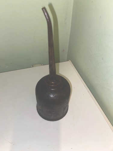 Vintage oil can with thumb - oil,