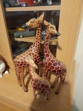 A Family Of 3 Hard Carved