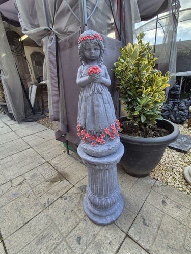 Lady large plinth - on, a