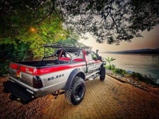 To Fit MITSUBISHI L200 K74 PICK UP.  Wide wheel arches fender flares extension.