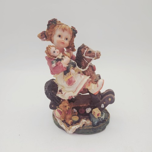 Girl rocking horse with - girl, on