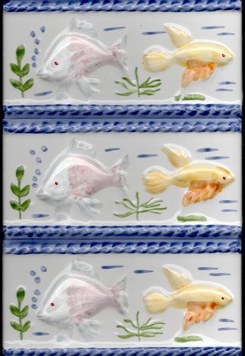 Hand painted sculpted fish - hand,