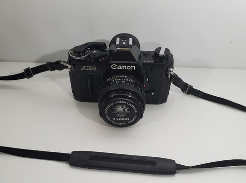 Canon black slr film - ae-1,