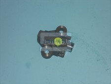 Timing belt tensioner for
