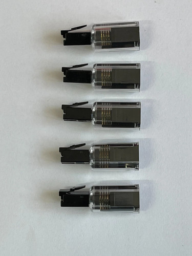 Clear black telephone - /,
