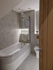 The Doccia frameless Folding Bath Shower Screen