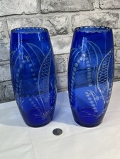 A Pair Of Crystal Blue Vases