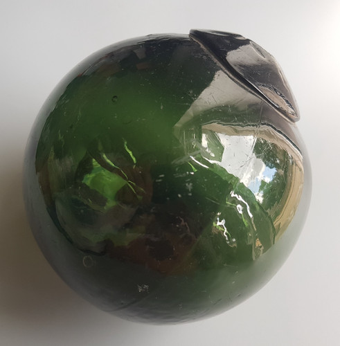 Antique glass float sea
