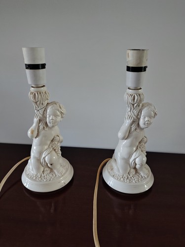 Pair vintage cherub table - of,