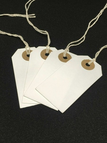 White strung tie tags - tie,