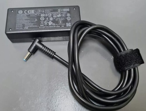 Genuine laptop charger no - genuine,