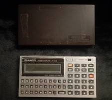 Pair of Sharp Pocket Computer