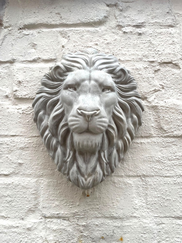 Large lions head garden - lions,