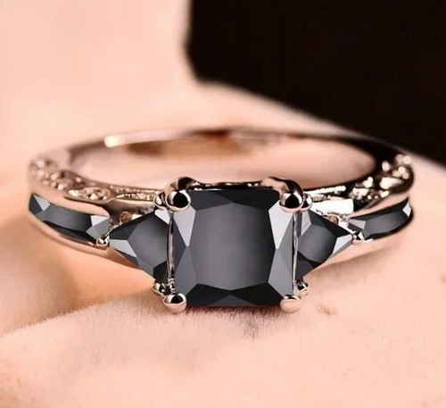 Silver ring with black - , centre