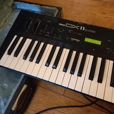 Yamaha DX11 vintage synth. Flight cased and working.