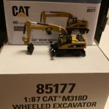 DIECAST MASTERS REF No85177 CATERPILLAR  M318D WHEELED EXCAVATOR 1.87 & HO Scale