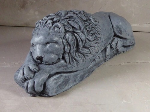 Cast stone resting - resting, lion