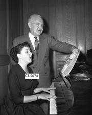 Judy Garland Playing Piano with Los Angeles Mayor Fletcher Bowron Photo