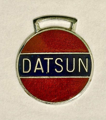Vintage datsun red enamel - vintage,