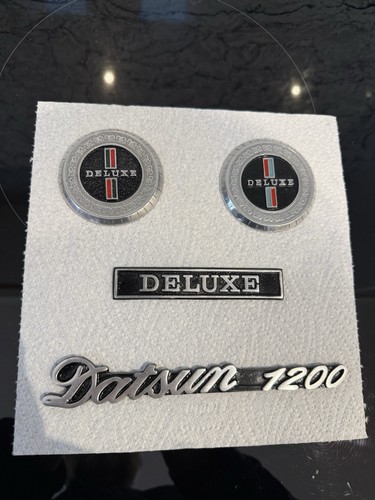 Datsun 1200 badges - datsun,