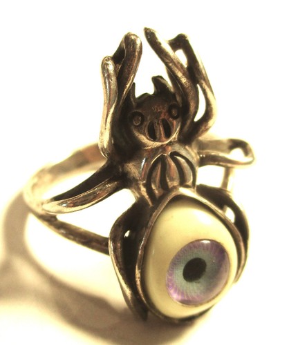 Silver prosthetic eye evil - prosthetic,