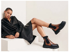 RUSSELL & BROMLEY Conquer