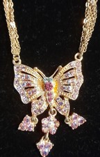 KIRKS FOLLY BUTTERFLY NECKLACE W/HEART CHARMS, GOLDTONE WITH PINKS, SIGNED