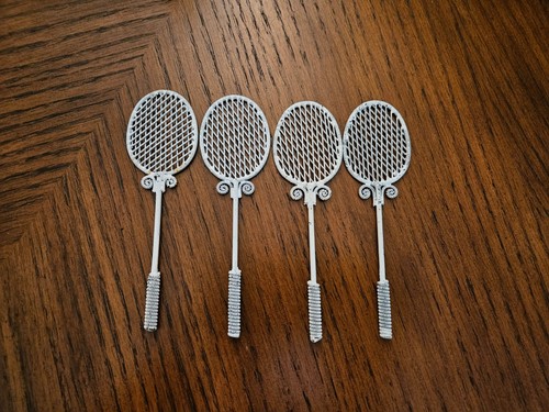 Ornate metal tennis racket - metal,