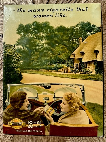 Vintage celluloid tin gold - on,