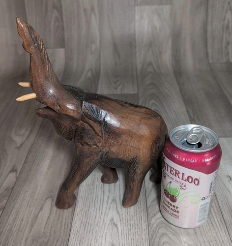 Hand carved wooden - hand, elephant