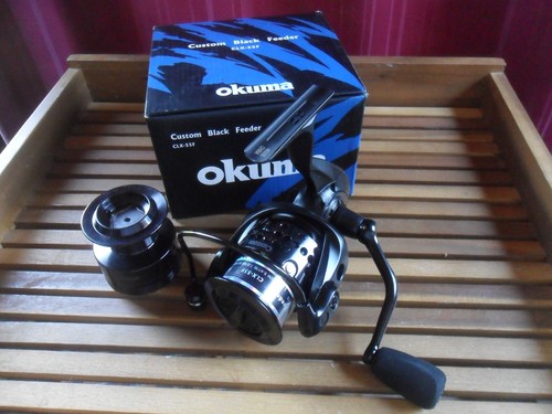Okuma custom black feeder - okuma,