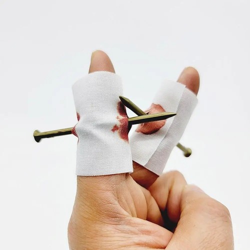 Nail through finger prank toy - nail,