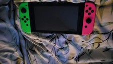 Used & Acceptable Nintendo Switch Console 25GB With Neon Pink And Green Joycons