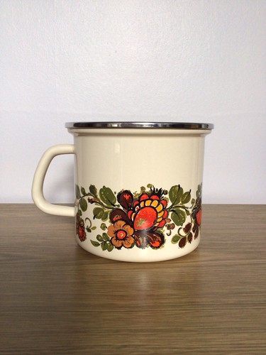 Vintage enamel floral pitcher