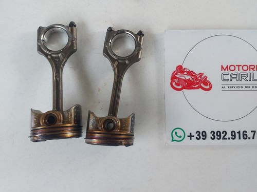 Honda 700 pistons - honda,